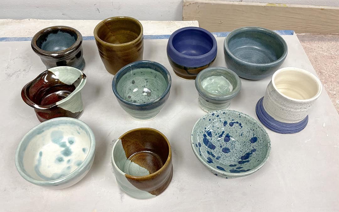 pottery wheel students first pots